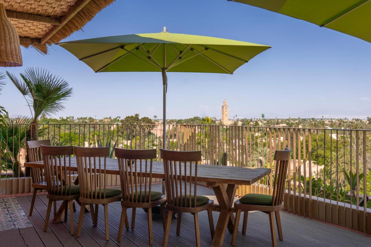 Hotel Jadali&Spa Marrakesh Bagian luar foto A patio umbrella