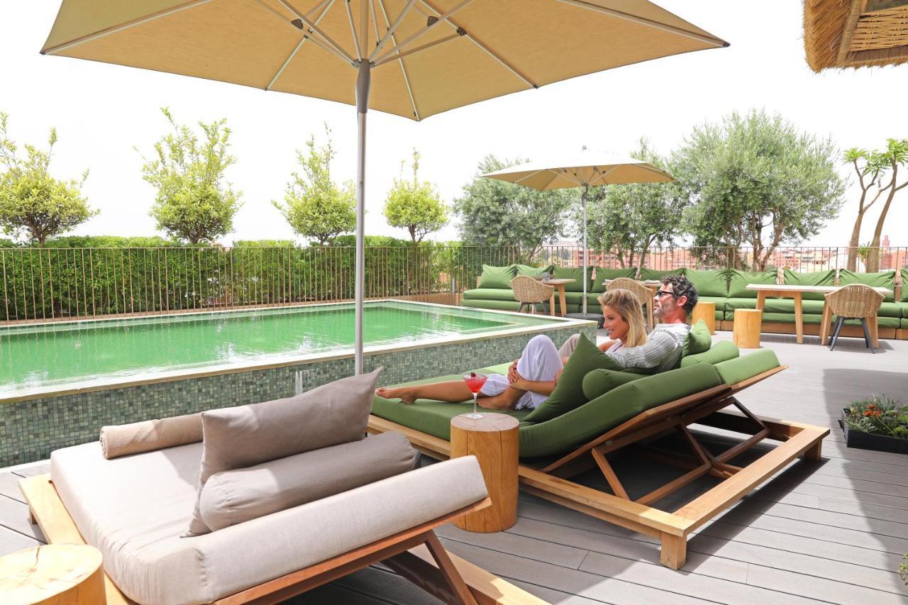 Hotel Jadali&Spa Marrakesh Bagian luar foto The pool at the hotel