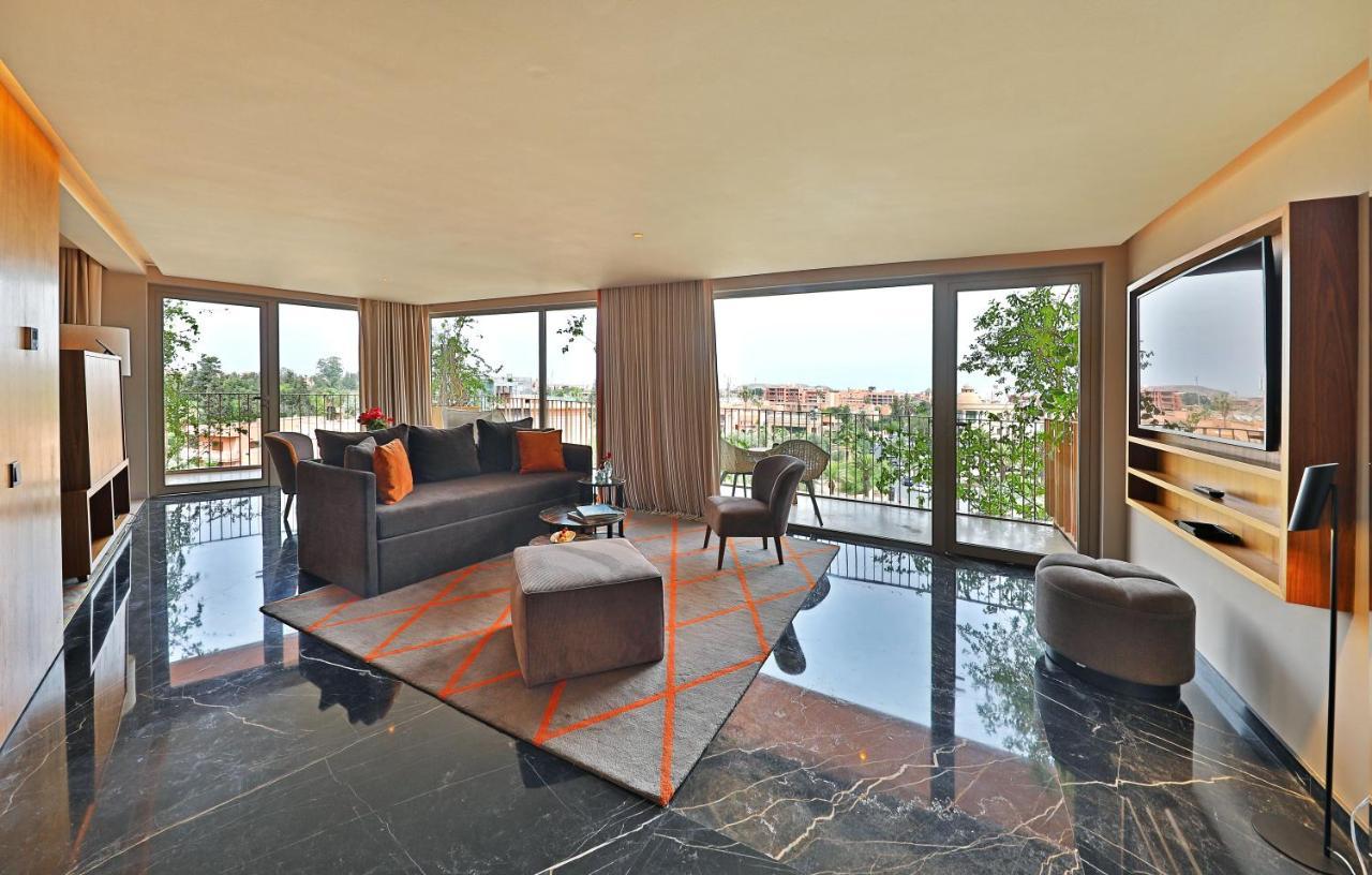 Hotel Jadali&Spa Marrakesh Bagian luar foto The living room of a suite at the hotel